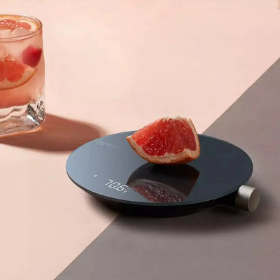 Compact digital kitchen scale designed for precision weighing in cooking and baking tasks