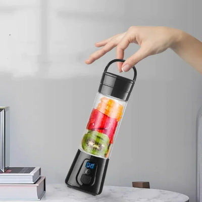 Close-up of Portable USB Juicer Cup with detachable blade and clear container

